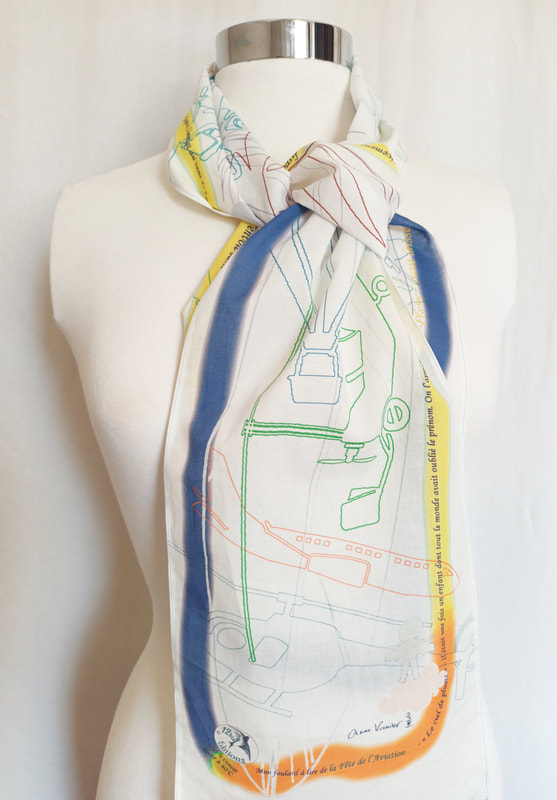 Le Rectangle de la Fête de l'Aviation. Un foulard de 20 x 145 cm, imprimé en France avec des encres éco-responsables sur un voile 100% coton. Le carré existe en 7 coloris.
